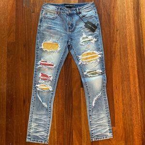 Men’s Sz 32” Slim Denim, Multi Colored Backing w/ Rhinestones.